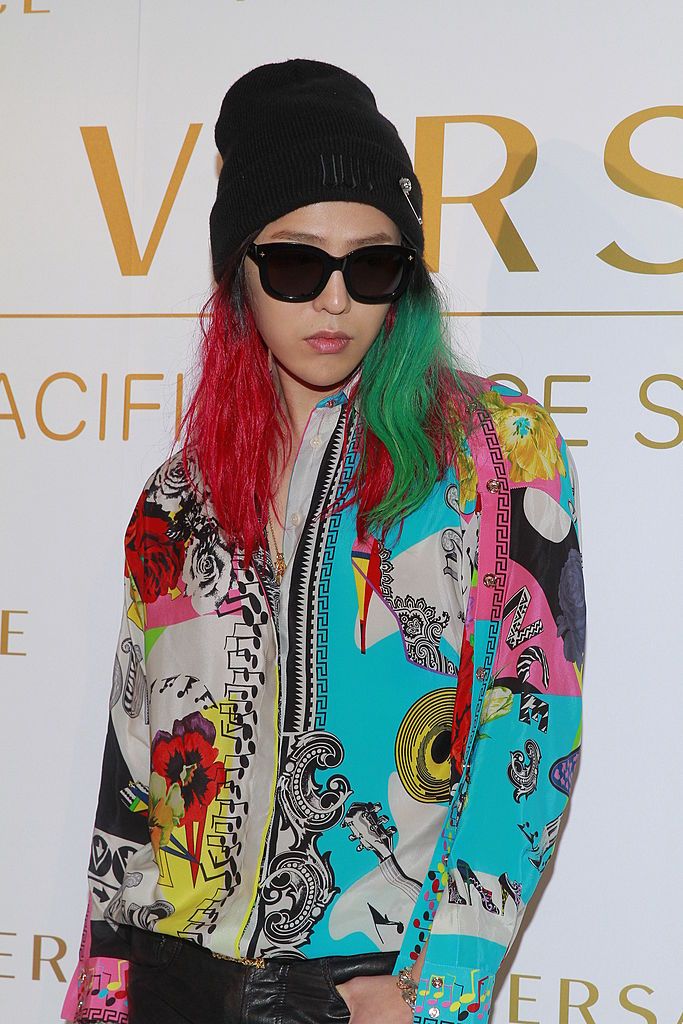 HONG KONG - MAY 19: (CHINA OUT) South Korean singer G-Dragon attends Versace store opening ceremony at Pacific Place on May 19, 2013 in Hong Kong, Hong Kong. (Photo by Visual China Group via Getty Images/Visual China Group via Getty Images)