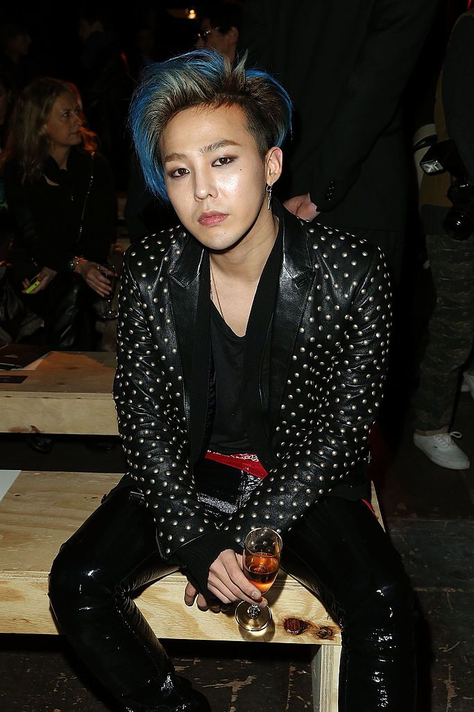 PARIS, FRANCE - JANUARY 19: G-Dragon attends the Saint Laurent Menswear Fall/Winter 2014-2015 Show as part of Paris Fashion Week on January 19, 2014 in Paris, France. (Photo by Michel Dufour/WireImage)