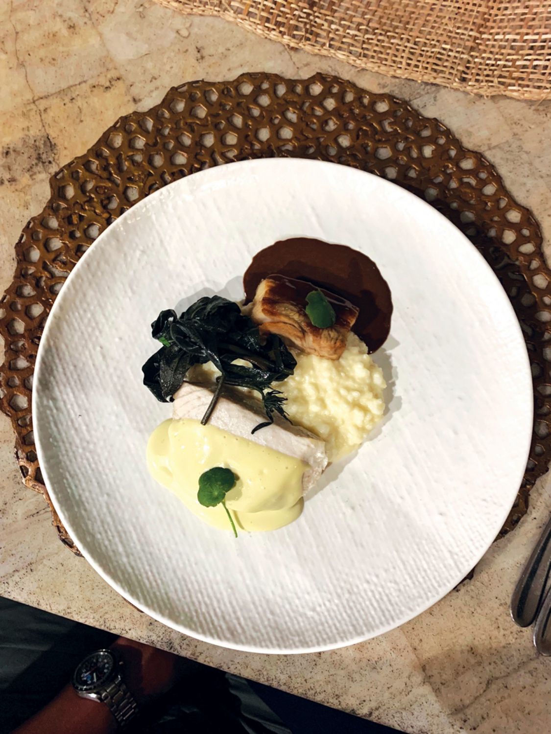 A surf and turf number featuring Bohol marlin and pork belly confit