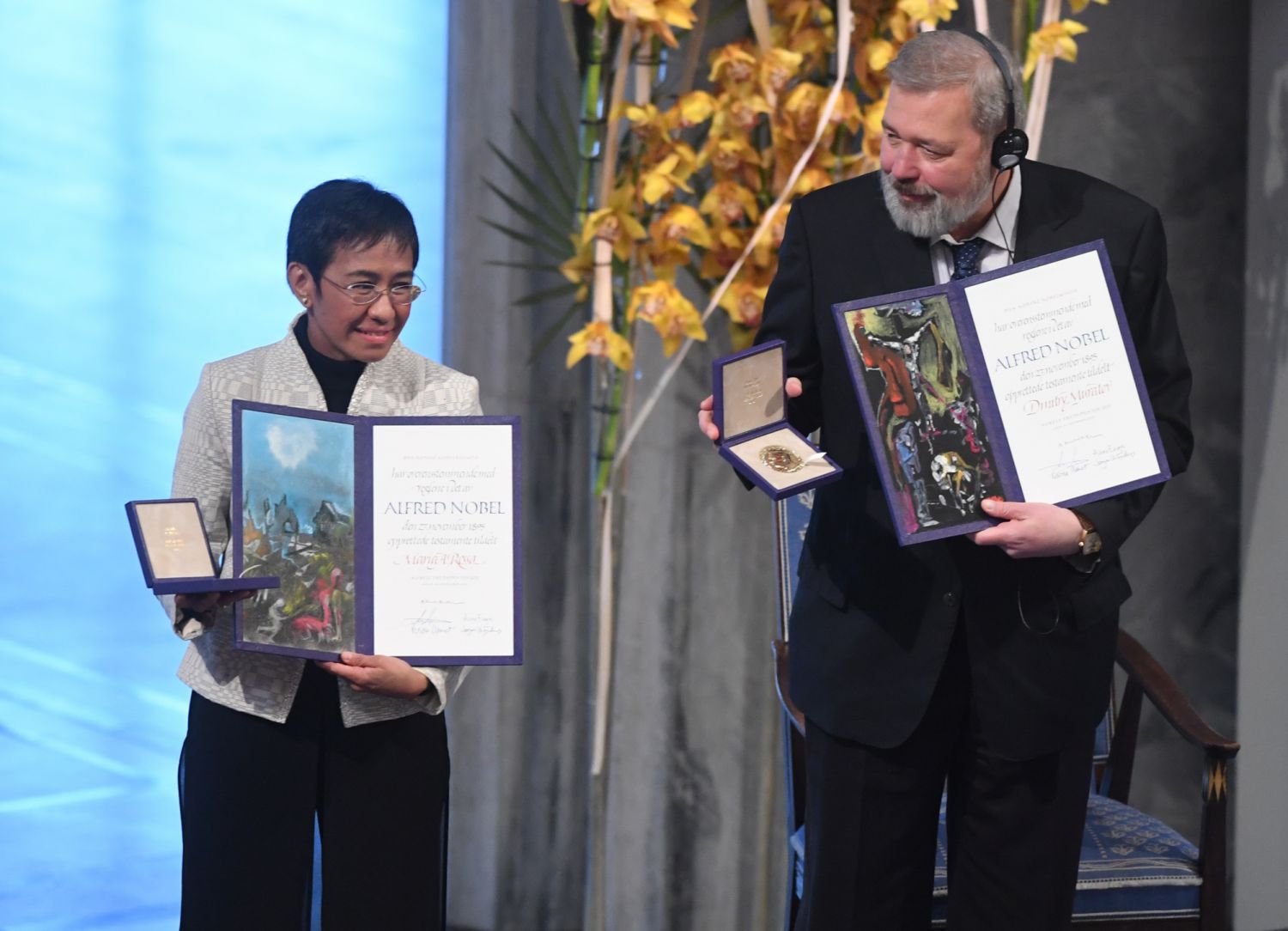 OSLO, NORWAY- DECEMBER 10: Dmitrij Muratov and Maria Ressa attend the Nobel Peace Prize ceremony 2021 at Oslo City Town Hall on December 10, 2021 in Oslo, Norway. (Photo by Rune Hellestad - Corbis/Corbis via Getty Images)