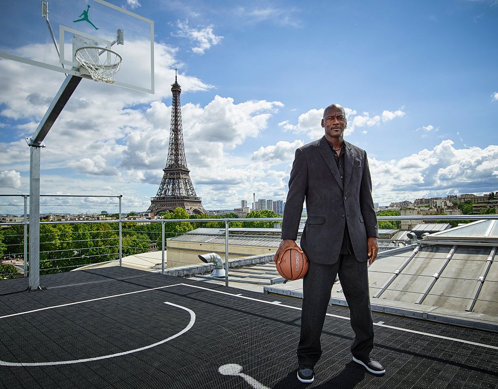 PARIS, FRANCE - JUNE 12: In this handout image provided by Jordan Brand, Michael Jordan paid a visit to Palais 23 this afternoon on Friday June 12, Joined by his frequent partners-in-design Tinker Hatfield and Mark Smith, key figures in the 30-year evolution of the Air Jordan, Jordan has returned to Paris to mark the 30th anniversary of 1985's Air Jordan One. Palais 23 is a spectacular tribute to the shoes, moments, designs and artifacts that have shaped the 30-year evolution of the Air Jordan. (Photo by Jo
