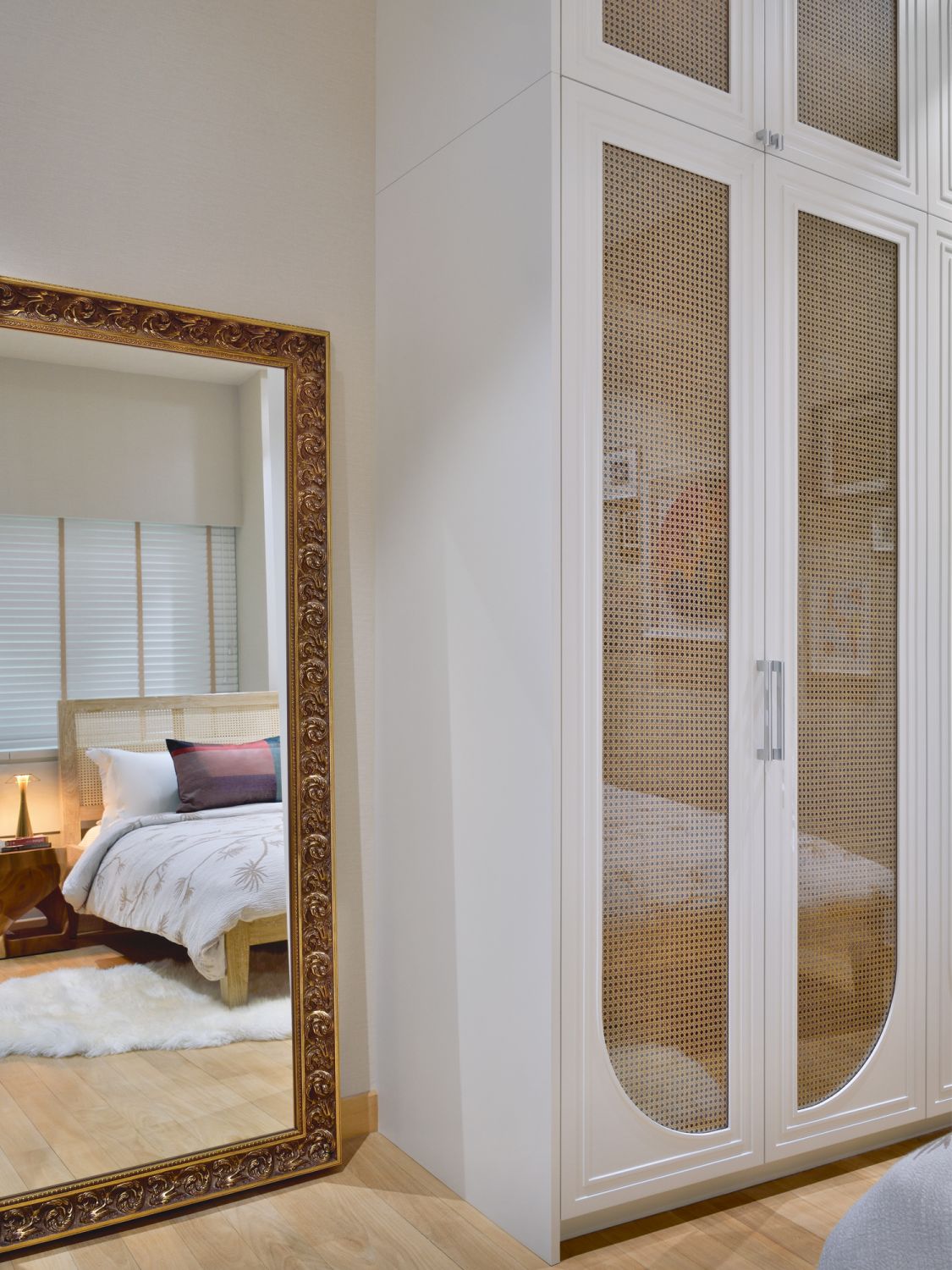 A full-length mirror is casually placed against a wall for a “relaxed yet elegant look”, says the designer
