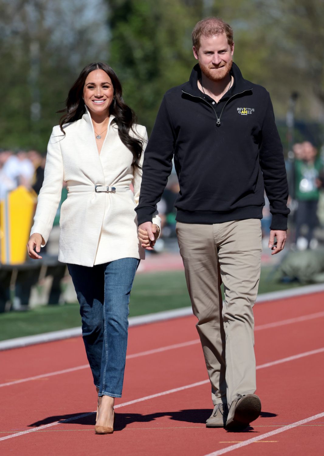 THE HAGUE, NETHERLANDS - APRIL 17: Prince Harry, Duke of Sussex and Meghan, Duchess of Sussex attend the Athletics Competition during day two of the Invictus Games The Hague 2020 at Zuiderpark on April 17, 2022 in The Hague, Netherlands. (Photo by Chris Jackson/Getty Images for the Invictus Games Foundation)