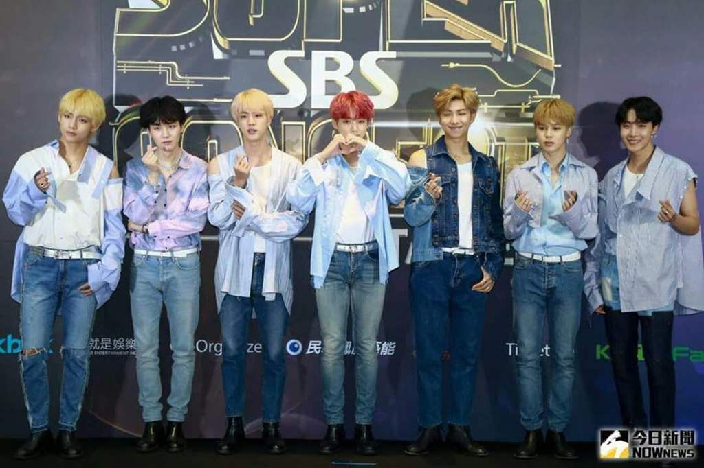 BTS at SBS Pop Asia wearing variations of the striped blue piece. (Photo: Amino Apps)