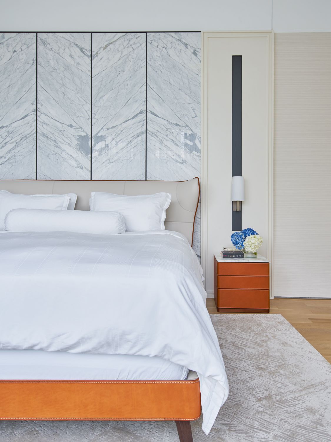 The Poltrona Frau Mamy Blue bed by Roberto Lazzeroni is the centrepiece of the master bedroom