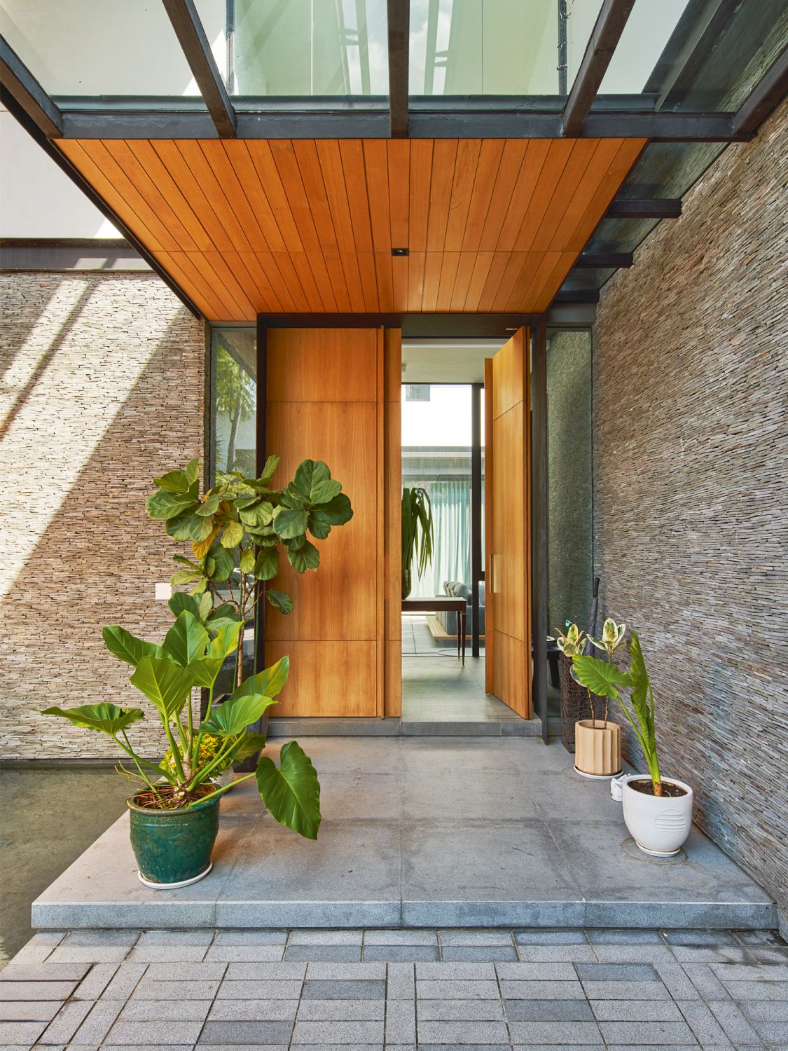 The floor plan of this Good Class Bungalow takes inspiration from the layout of French townhouses, with its formal entrance, private courtyard and rear garden
