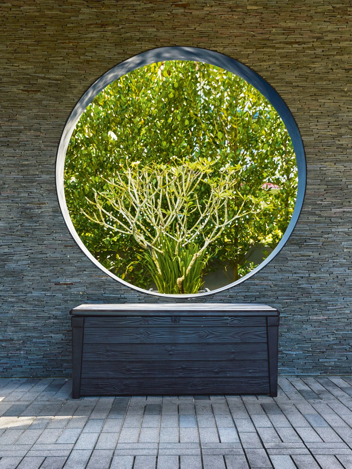 This picture window perfectly frames a view of the garden