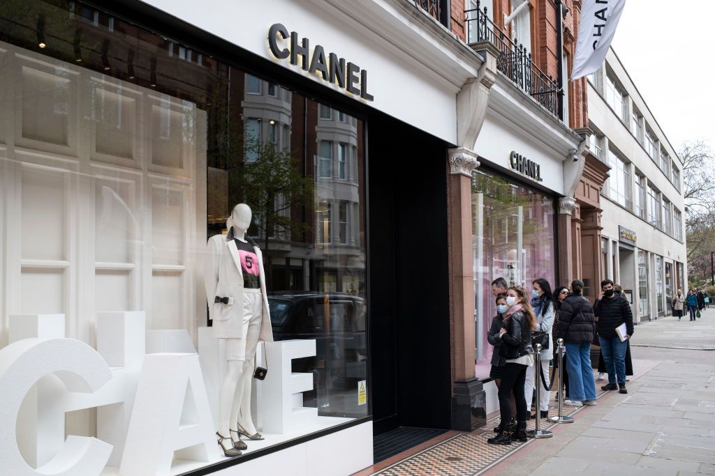 Shopping queue outside the Chanel store in the upmarket area of Knightsbridge on 14th April 2021 in London, United Kingdom. Knightsbridge is one of the principal areas for exclusive, luxury goods in West London. It is known as a district where the rich and wealthy shop, mostly for high end fashion and jewellery. (photo by Mike Kemp/In Pictures via Getty Images)