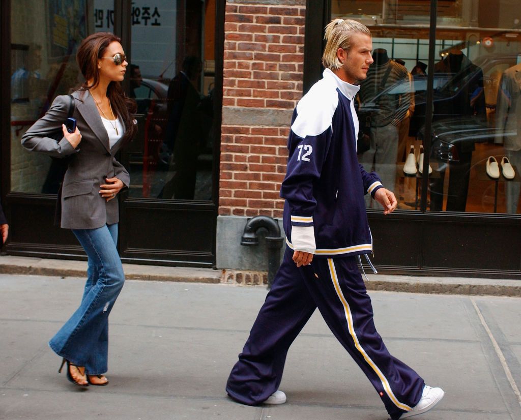 NEW YORK - MAY 27: England football captain David Beckham and his wife Victoria Beckham leave their Downtown hotel May 27, 2002 in New York City. (Photo by Mark Mainz/Getty Images)