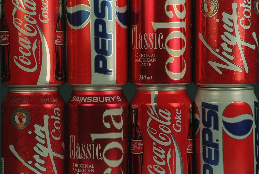 Cans Of Cola, Including COCA-COLA; PEPSI COLA; SAINSBURYS COLA and VIRGIN COLA. (Photo by Avalon/Getty Images)