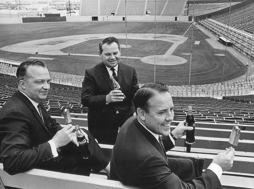 MAY 30 1965; Denver Bears Clinic Officials Get Early Start on Goodies; Sampling free refreshments to be given at Denver Post-Denver Bears baseball clinic June 12 are Bert Dragt (left) of Meadow Gold Ice Cream; Peter J. Berlute, Denver Coca-Cola Bottling Co., and Jim Burris, Denver Bears general manager.; (Photo By Orin Sealy/The Denver Post via Getty Images)
