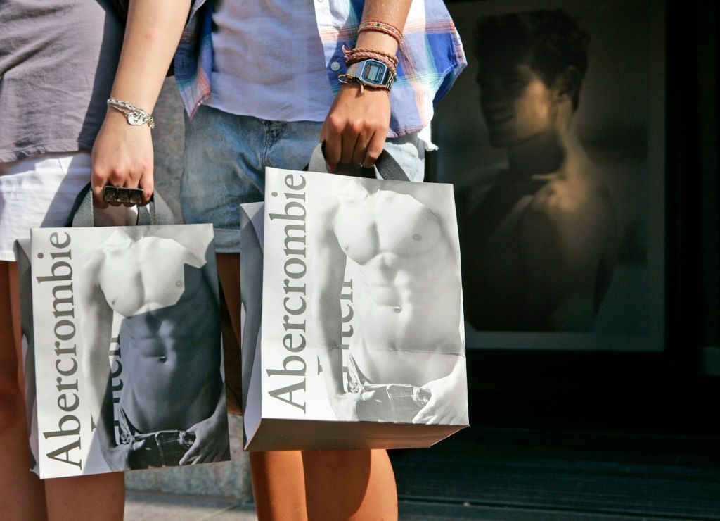 (071210, Boston, Massachusetts)Nuria Du Chene, 17, of Milan, Italy, and Marta Civit, 17, of Barcelona, Spain, show off their shopping bags outside of Abercrombie and Fitch at Faneuil Hall in Boston, MA on Monday, July 12, 2010.Staff Photo by Brooks CanadaySaved in Sunday (Photo by Brooks Canaday/MediaNews Group/Boston Herald via Getty Images)
