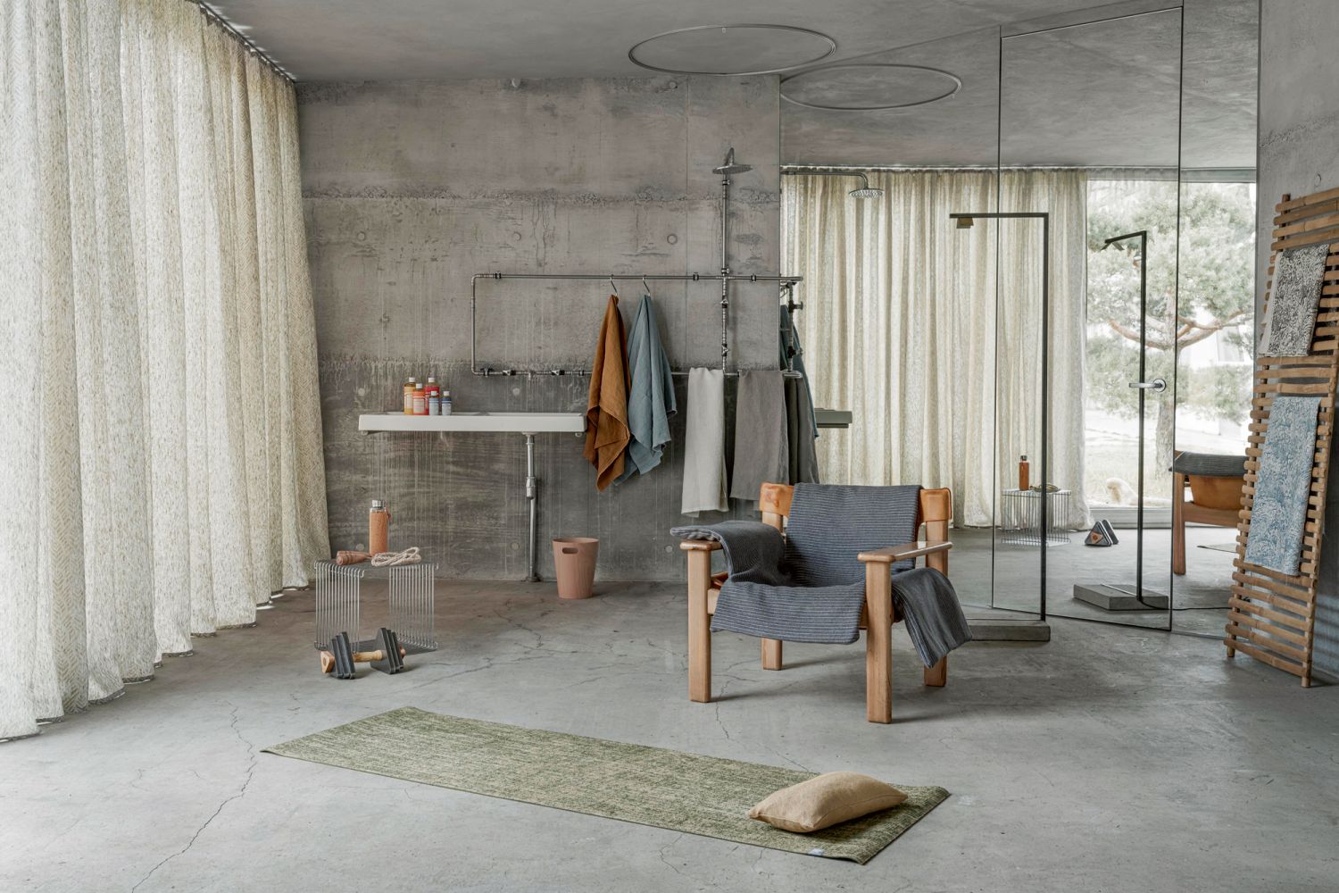 An industrial-style bathroom featuring upholstery fabrics from Hodsoll Mckenzie, available from Cetec