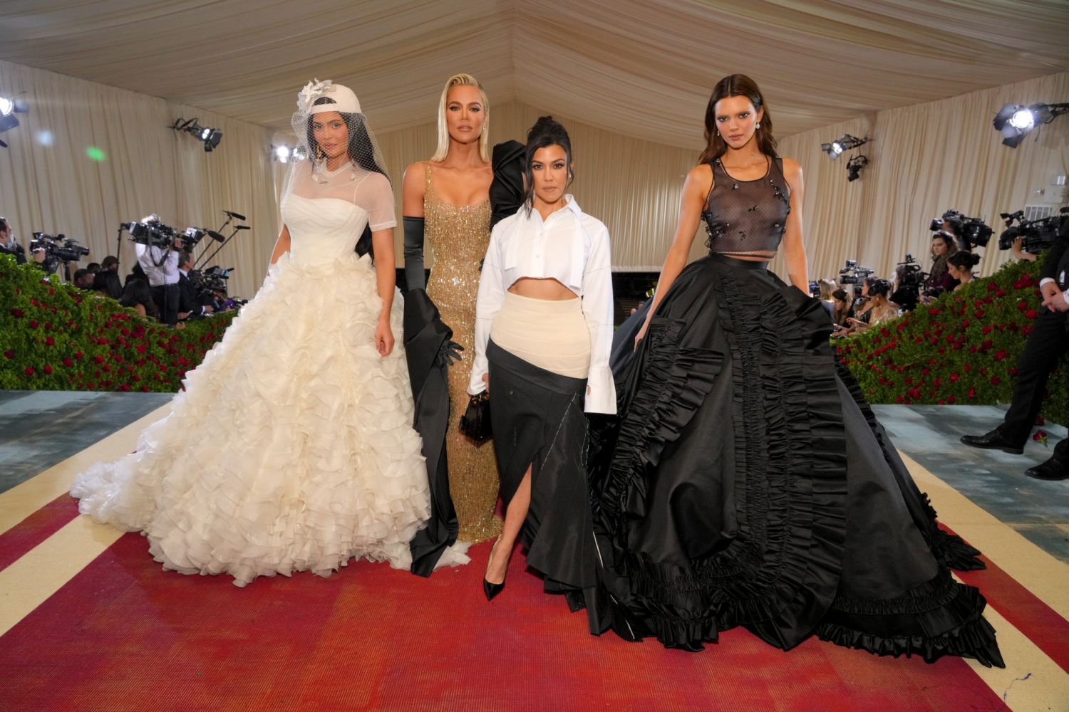 NEW YORK, NEW YORK - MAY 02: (Exclusive Coverage) (L-R) Kylie Jenner, Khloé Kardashian, Kourtney Kardashian, and Kendall Jenner arrive at The 2022 Met Gala Celebrating "In America: An Anthology of Fashion" at The Metropolitan Museum of Art on May 02, 2022 in New York City. (Photo by Kevin Mazur/MG22/Getty Images for The Met Museum/Vogue )