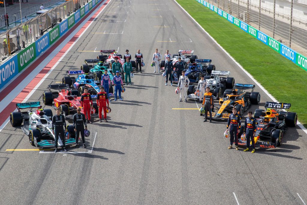 BAHRAIN, BAHRAIN - MARCH 10: (EDITORS NOTE: Image has been digitally retouched) The F1 drivers pose for a photo on the grid with their cars during Day One of F1 Testing at Bahrain International Circuit on March 10, 2022 in Bahrain, Bahrain. (Photo by Dan Istitene - Formula 1/Formula 1 via Getty Images)