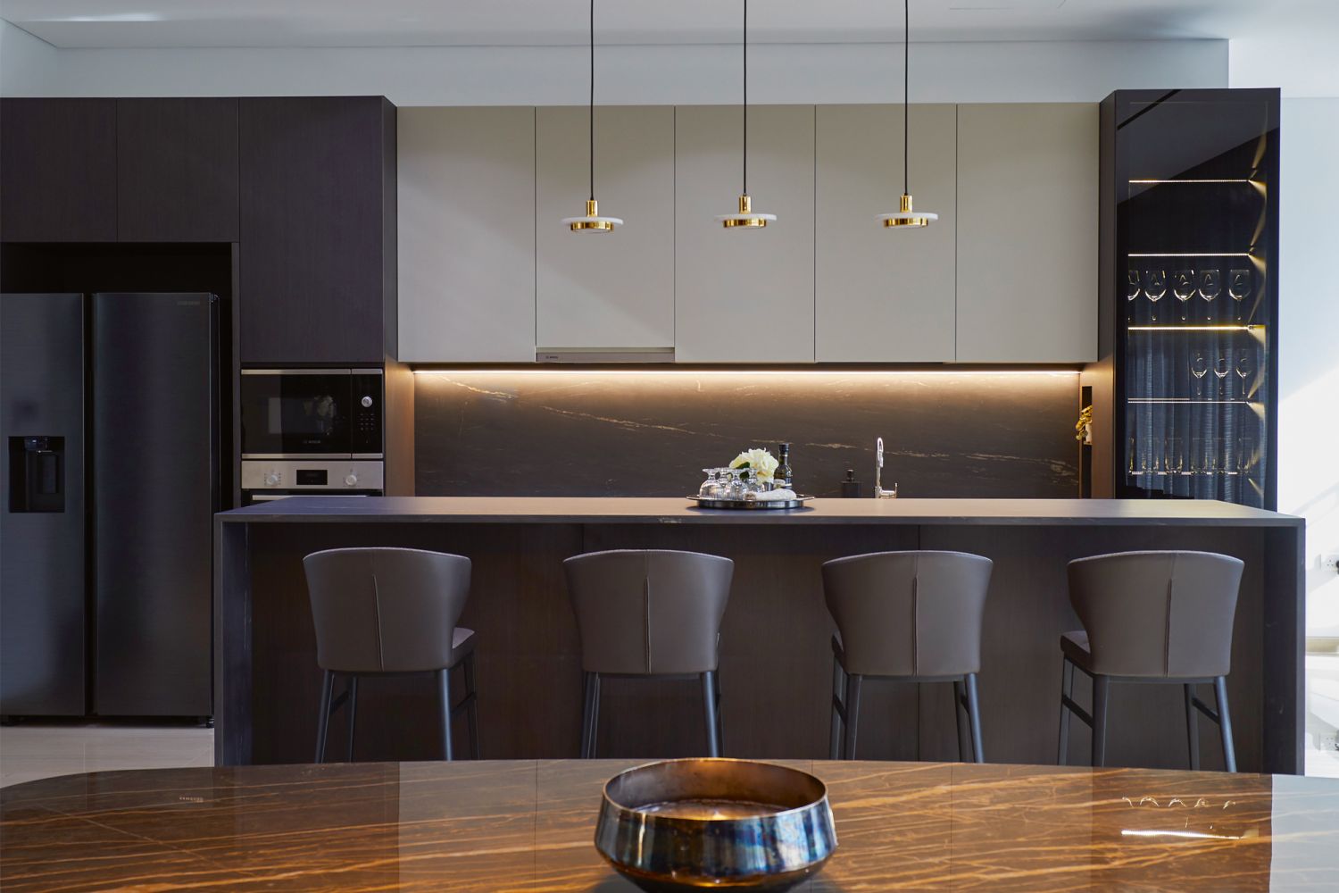 Leather bar stools from Lifestorey Prestige create an elegant yet casual breakfast spot at the kitchen island