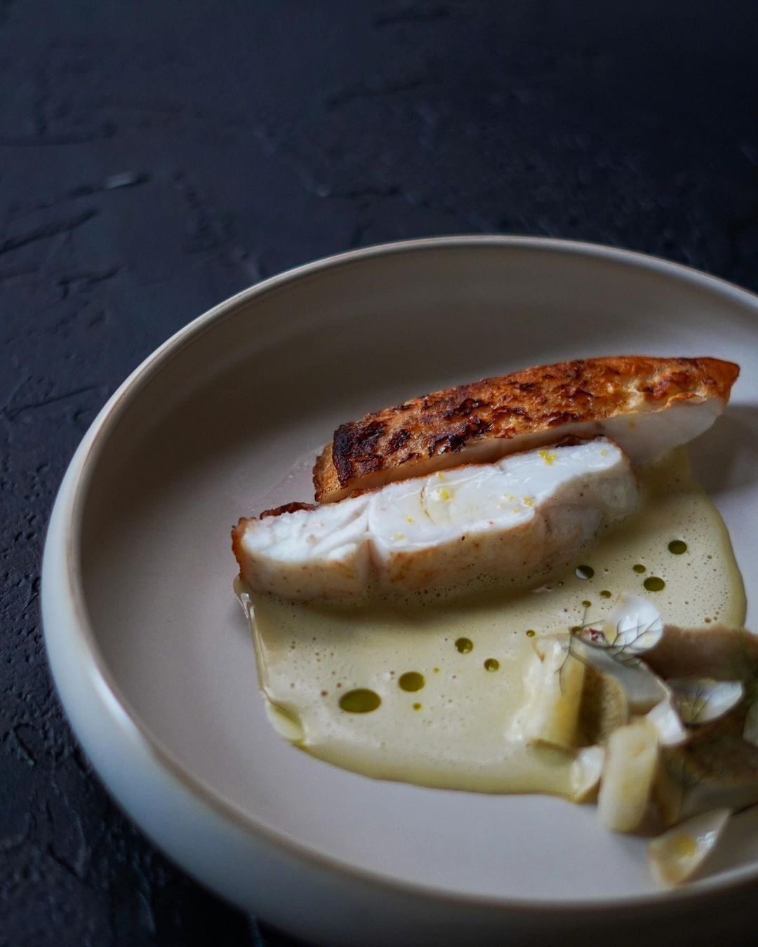 Grilled Red Coral Fish with Artichoke and Clam Besciamella Sauce (Photo: Instagram/@gooddamco)