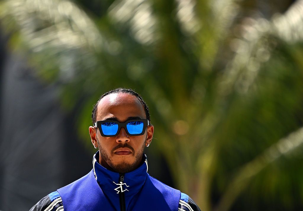MIAMI, FLORIDA - MAY 05: Lewis Hamilton of Great Britain and Mercedes walks in the Paddock during previews ahead of the F1 Grand Prix of Miami at the Miami International Autodrome on May 05, 2022 in Miami, Florida. (Photo by Clive Mason - Formula 1/Formula 1 via Getty Images)