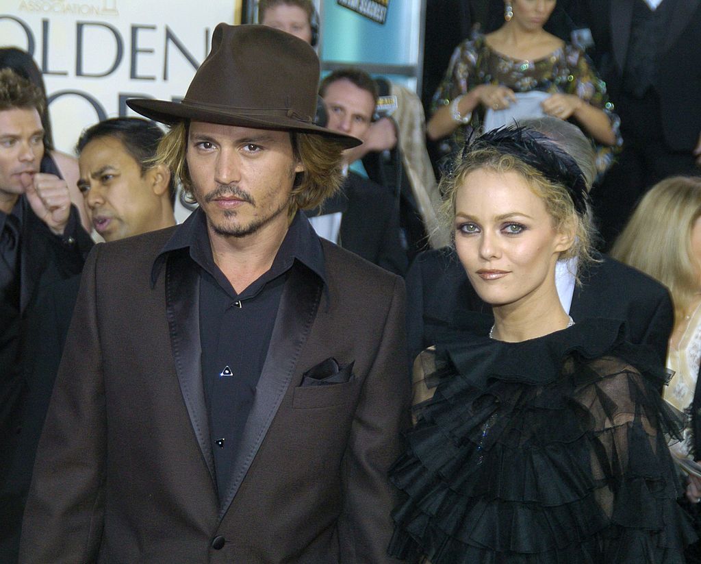 Johnny Depp and Vanessa Paradis during The 61st Annual Golden Globe Awards - Arrivals at The Beverly Hilton Hotel in Beverly Hills, California, United States. (Photo by Jeff Kravitz/FilmMagic, Inc)