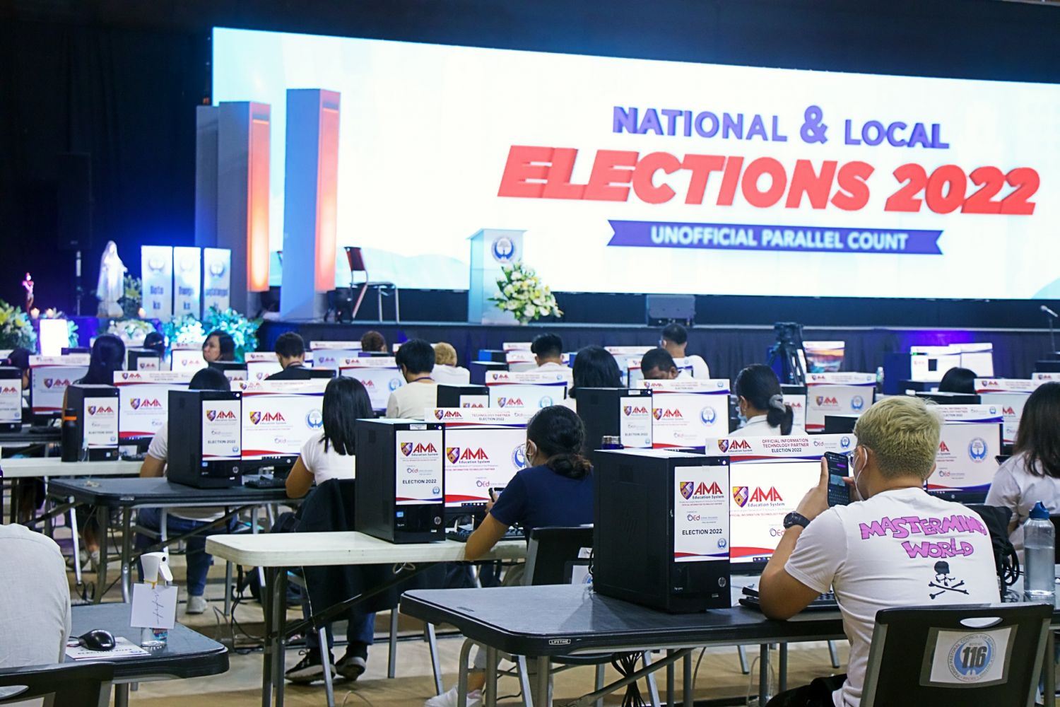 Volunteer manual encoders of PPCRV patiently wait for the 'fourth copy' of election returns from different districts
