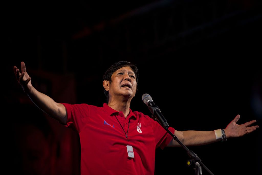 MANILA, PHILIPPINES - FEBRUARY 19: Ferdinand "Bongbong" Marcos Jr., the son of the late dictator Ferdinand Marcos, speaks during a rally as he campaigns for the presidency on February 19, 2022 in Caloocan, Metro Manila, Philippines. The son and namesake of ousted dictator Ferdinand Marcos, accused and charged of amassing billions of dollars of ill-gotten wealth as well as committing a record number of human rights abuses during his autocratic rule, has mounted a hugely popular campaign to return his family