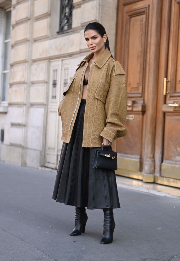 PARIS, FRANCE - MARCH 08: Victoria Barbara is seen wearing a a Peter Petrov leather jacket, Alexander Mcqueen leather skirt, Fendi boots, Bottega Veneta sunglasses and a Hermes bag during Paris Fashion Week A/W 2022 on March 08, 2022 in Paris, France. (Photo by Daniel Zuchnik/Getty Images)