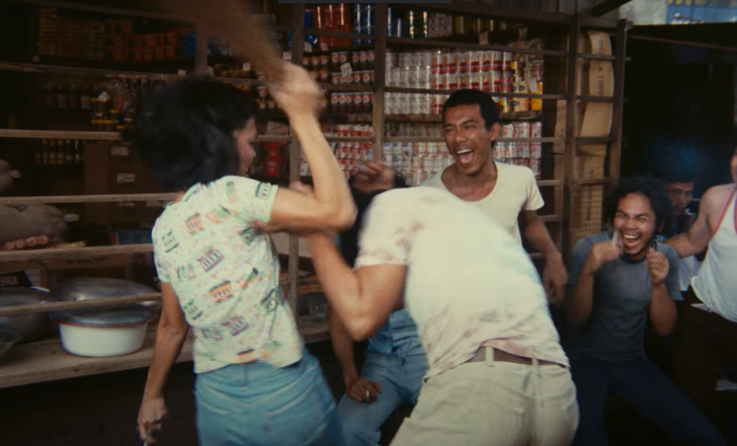 Sexual assault against women is not an uncommon scene in Tondo, Manila. In this part of the movie, Ludy throws a fit after a man grabs her private part without consent (Photo: Carlotta Films/Youtube)