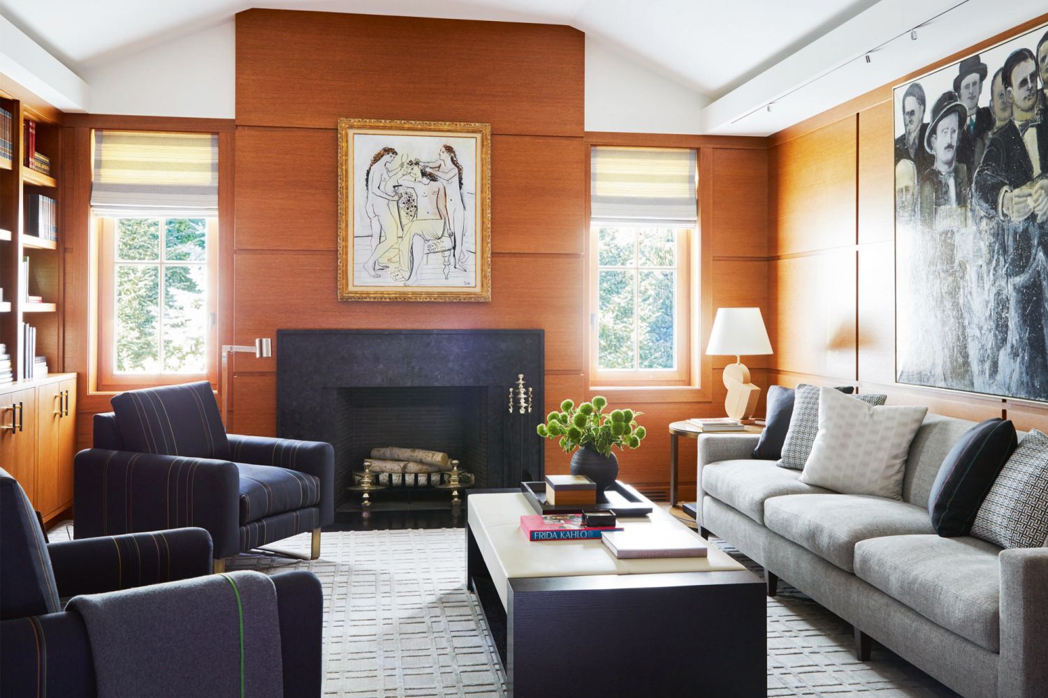 A plush sofa and armchairs contribute to the cosy feel of the informal living room