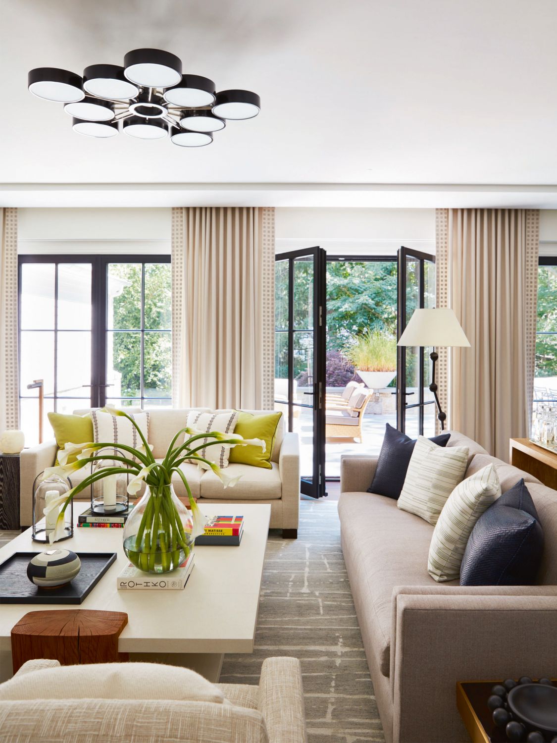 French doors connect the interiors to the serene outdoor garden