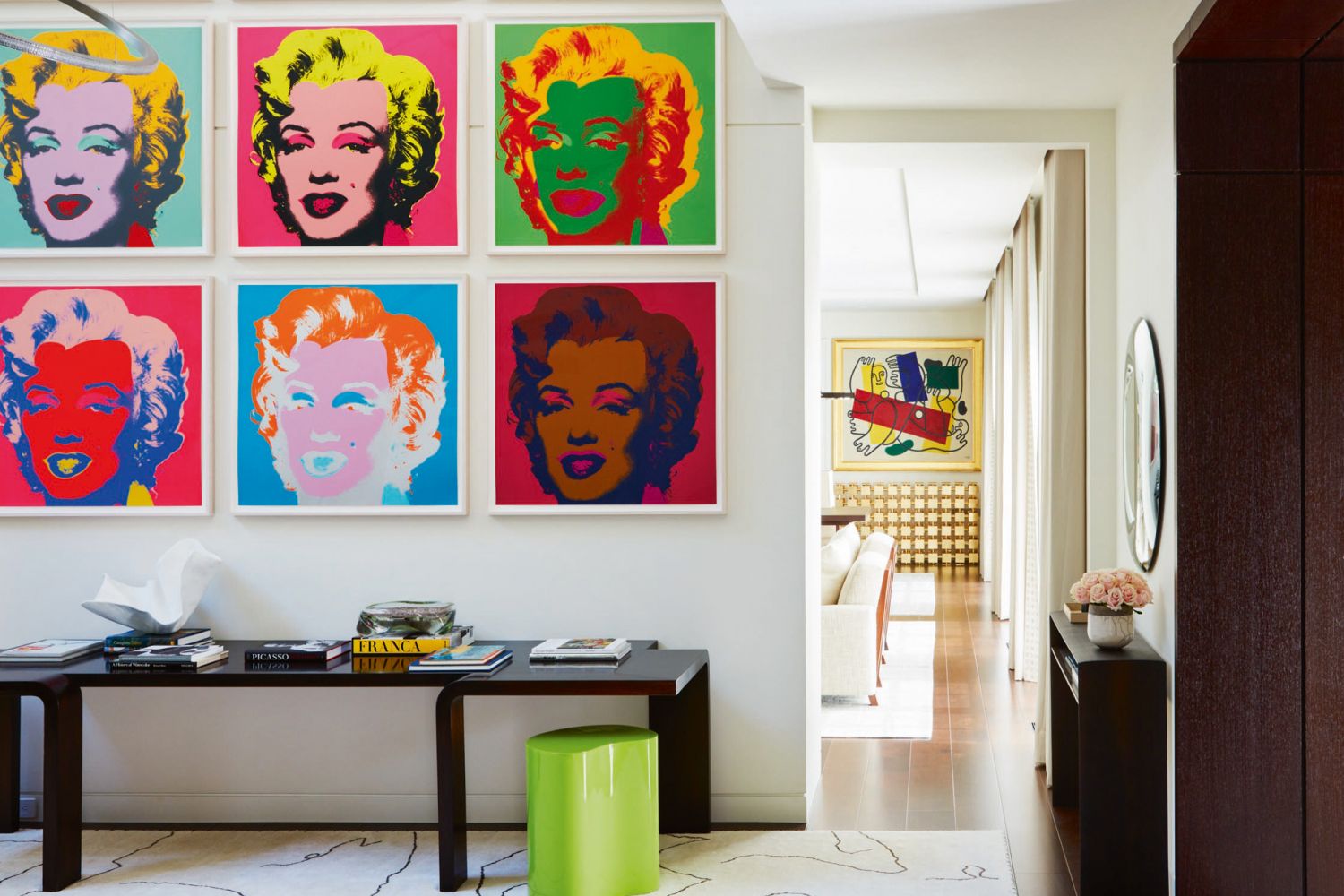An entire wall is dedicated to the Marilyn Monroe print series by Andy Warhol at the entrance hall