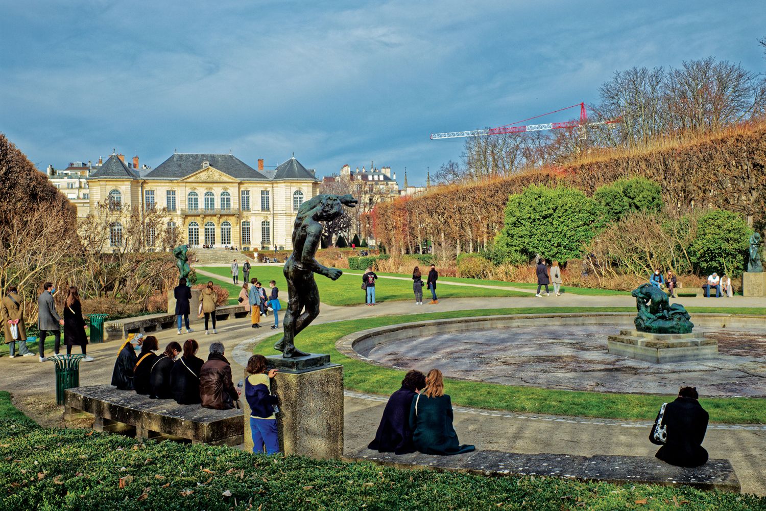 People visit the statues of Rodin exposed at the Garden of the Rodin Museum, in Paris, France, on February 20, 2021 amid the Covid-19 pandemic. (Photo by Daniel Pier/NurPhoto via Getty Images)