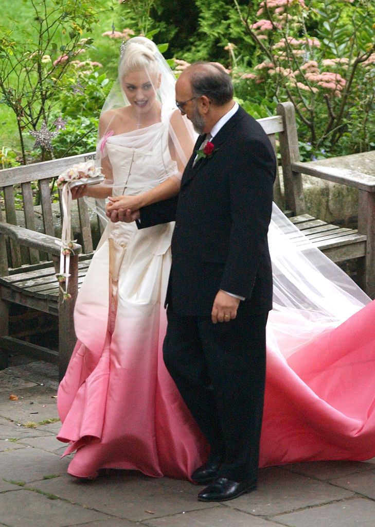 LONDON, UK - SEPTEMBER 9: Gwen Stefani with her father Dennis Stefani during the wedding ceremony of Gwen Stefani and Gavin Rossdale held on September 14, 2002 at St Paul's Cathedral in Covent Garden in London, England. (Photo by James Whatling/UK Press via Getty Images)