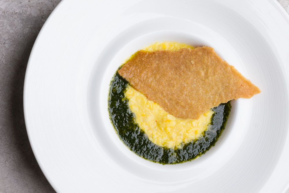Corn humita with basil and crunchy faina