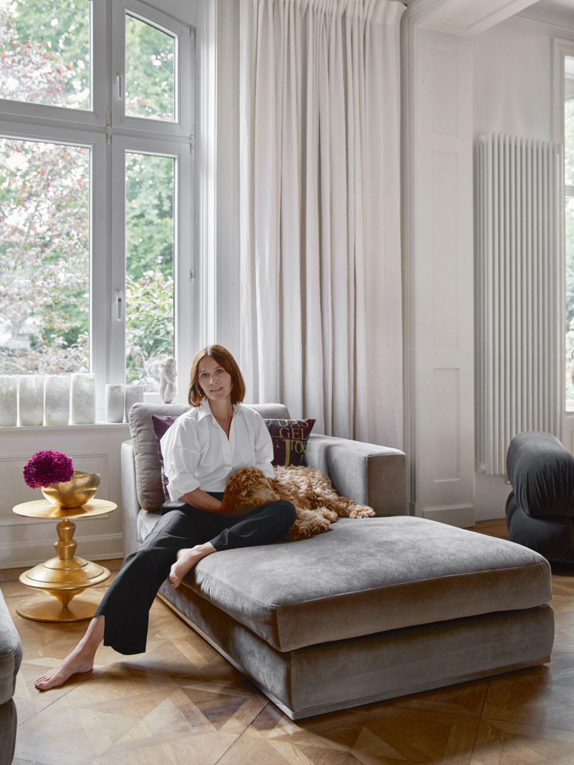 Homeowner Karin Schandorff and her labradoodle dog Freya