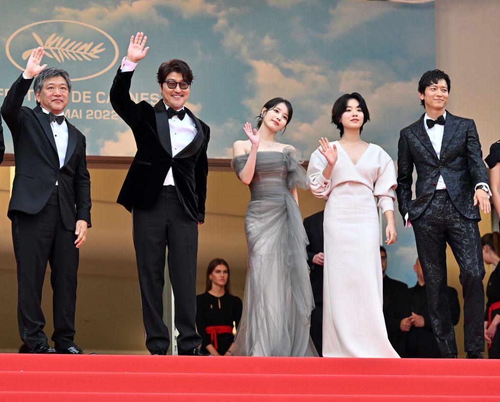 CANNES, FRANCE - MAY 26: Japanese film director Hirokazu Koreeda, South Korean actor Song Kang-Ho, South Korean actress Lee Ji-Eun, South Korean actress Lee Joo-Young, South Korean actor Gang Dong-Won arrive for the screening of the film Broker (Les Bonnes Etoiles) at the 75th annual Cannes Film Festival in Cannes, France on May 26, 2022. (Photo by Mustafa Yalcin/Anadolu Agency via Getty Images)