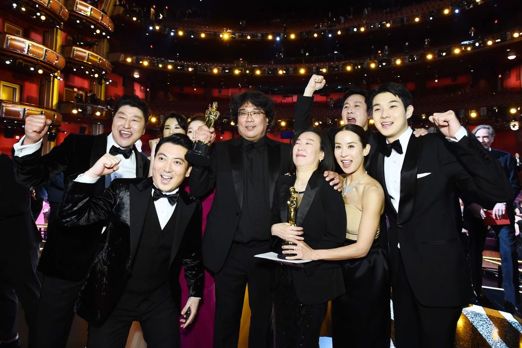 HOLLYWOOD, CALIFORNIA - FEBRUARY 09: In this handout photo provided by A.M.P.A.S. Best Picture Award winners for "Parasite" pose onstage during the 92nd Annual Academy Awards at the Dolby Theatre on February 09, 2020 in Hollywood, California. (Photo by Matt Petit - Handout/A.M.P.A.S. via Getty Images)