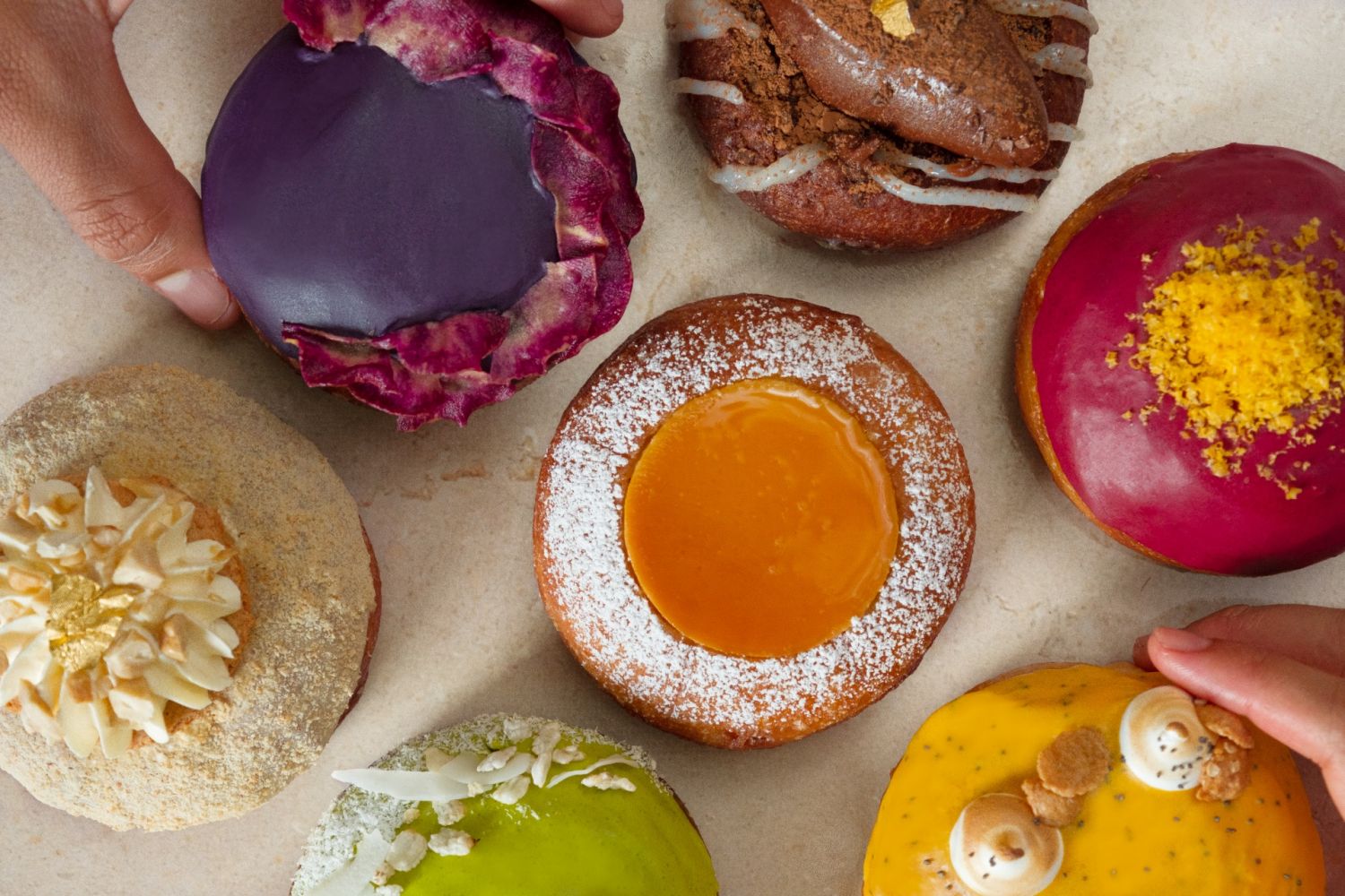 A vibrant spread of doughnuts from Kora