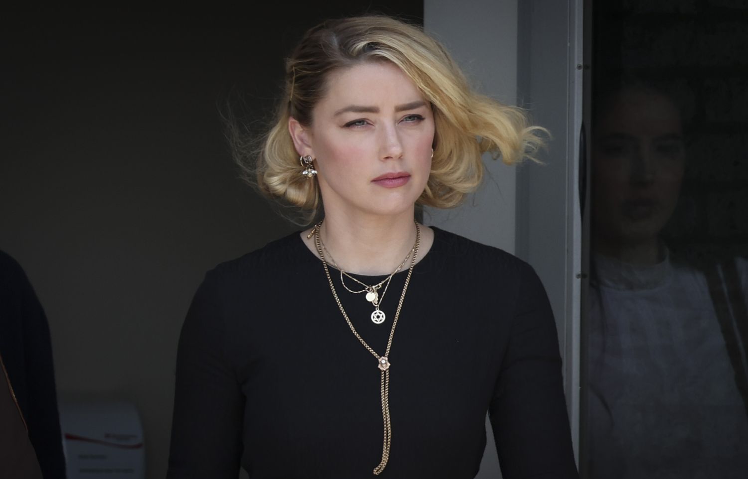 FAIRFAX, VIRGINIA - JUNE 01: Actress Amber Heard departs the Fairfax County Courthouse on June 1, 2022 in Fairfax, Virginia. The jury in the Depp vs. Heard case awarded actor Johnny Depp $15 million in his defamation case against Heard. (Photo by Win McNamee/Getty Images)