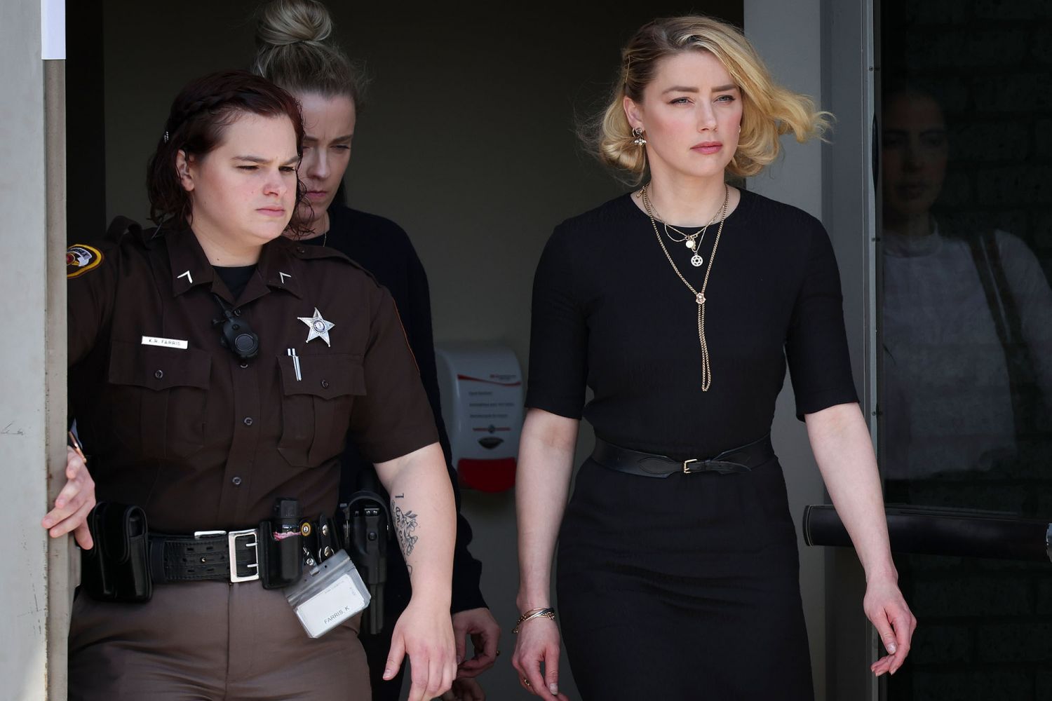Actress Amber Heard departs the Fairfax County Courthouse. (Photo: Getty Images)