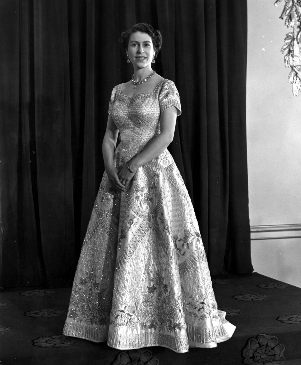 4th June 1953: Queen Elizabeth II wearing a gown designed by Norman Hartnell for her Coronation ceremony. (Photo by Central Press/Getty Images)