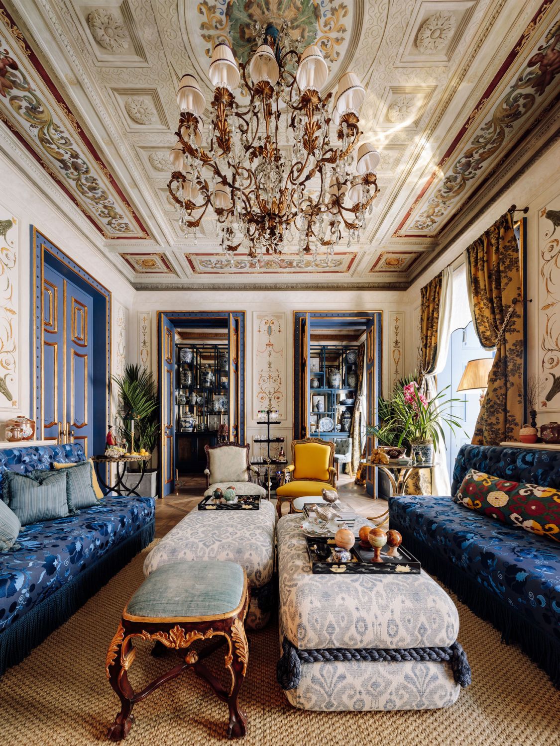 The home office library is accessible through twin doors in the second living room