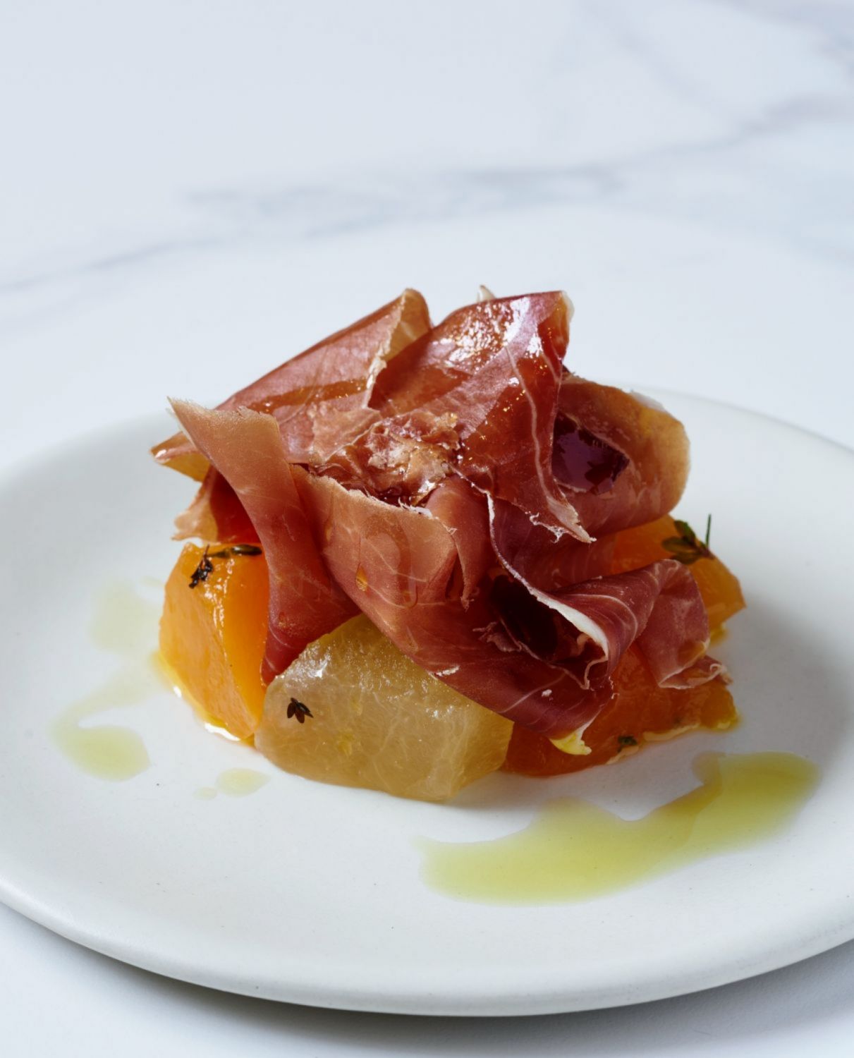 Melon compressed in thyme with Serrano jamon (Photo: Sonny Thakur)
