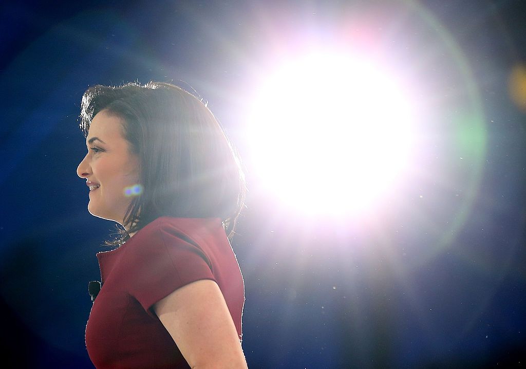 SAN FRANCISCO, CA - NOVEMBER 20: Facebook COO Sheryl Sandberg looks on before speaking in conversation with Salesforce chairman and CEO Marc Benioff at the 2013 Dreamforce conference on November 20, 2013 in San Francisco, California. The annual Dreamforce conference runs through November 21. (Photo by Justin Sullivan/Getty Images)
