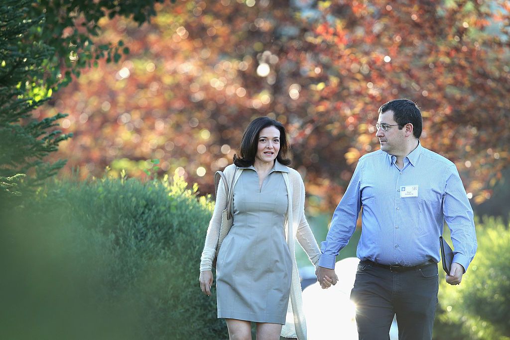 SUN VALLEY, ID - JULY 09: Sheryl Sandberg, chief operating officer (COO) of Facebook, and her husband David Goldberg, CEO of SurveyMonkey, attend the Allen & Company Sun Valley Conference on July 9, 2014 in Sun Valley, Idaho. Many of the worlds wealthiest and most powerful businessmen from media, finance, and technology attend the annual week-long conference which is in its 32nd year. (Photo by Scott Olson/Getty Images)