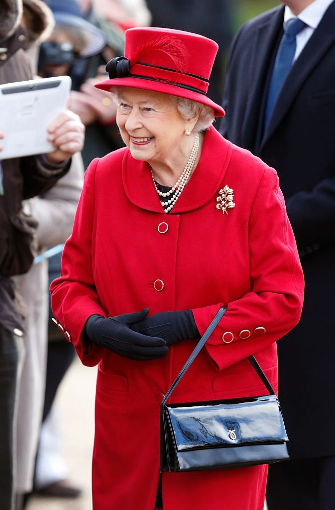 KING'S LYNN, UNITED KINGDOM - FEBRUARY 07: (EMBARGOED FOR PUBLICATION IN UK NEWSPAPERS UNTIL 48 HOURS AFTER CREATE DATE AND TIME) Queen Elizabeth II meets members of the public during a walkabout after attending Sunday service at the Church of St Peter & St Paul, West Newton on February 7, 2016 in King's Lynn, England. (Photo by Max Mumby/Indigo/Getty Images)