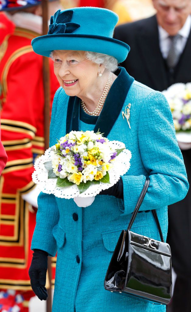 LEICESTER, UNITED KINGDOM - APRIL 13: (EMBARGOED FOR PUBLICATION IN UK NEWSPAPERS UNTIL 48 HOURS AFTER CREATE DATE AND TIME) Queen Elizabeth II carries a nosegay as she attends the traditional Royal Maundy service at Leicester Cathedral on April 13, 2017 in Leicester, England. During the service The Queen distributed ceremonial Maundy Money to 91 men and 91 women from the local community. (Photo by Max Mumby/Indigo/Getty Images)