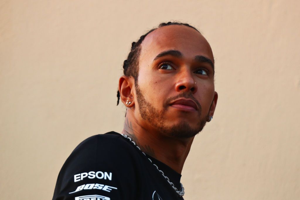 ABU DHABI, UNITED ARAB EMIRATES - NOVEMBER 28: Lewis Hamilton of Great Britain and Mercedes GP looks on in the Paddock during previews ahead of the F1 Grand Prix of Abu Dhabi at Yas Marina Circuit on November 28, 2019 in Abu Dhabi, United Arab Emirates. (Photo by Dan Istitene/Getty Images)