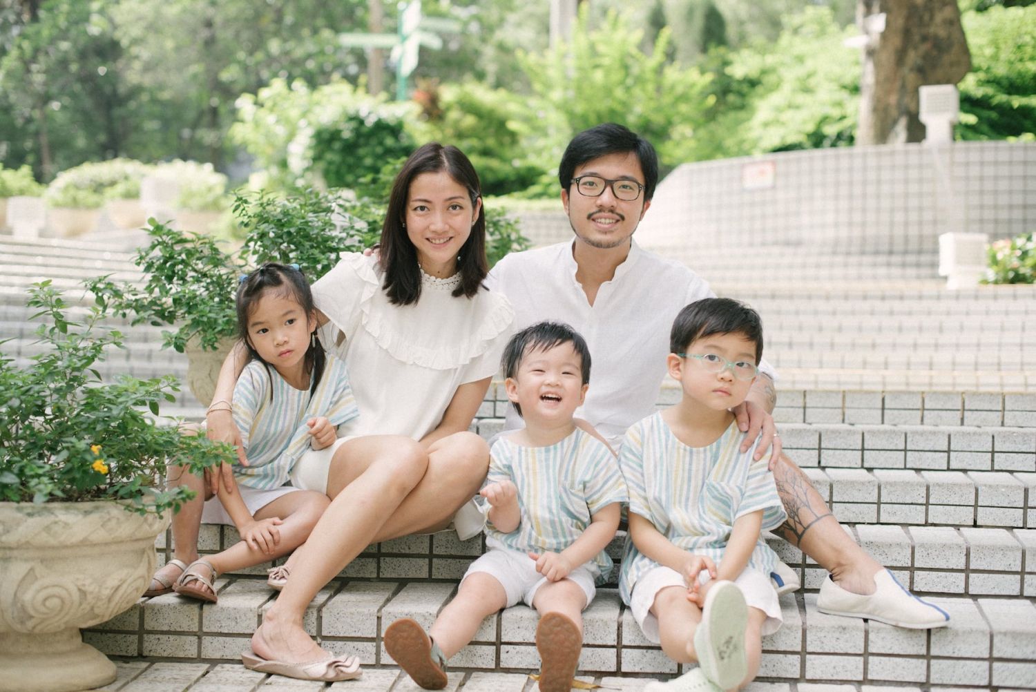 Nicholas Ho with his wife Stephanie Poon and three kids