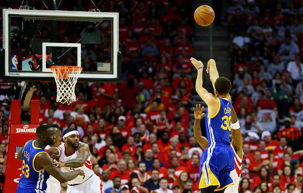 HOUSTON, TX - MAY 23: Stephen Curry #30 of the Golden State Warriors shoots a three pointer to set the record for most three pointers in a post season in the second quarter against the Houston Rockets during Game Three of the Western Conference Finals of the 2015 NBA PLayoffs at Toyota Center on May 23, 2015 in Houston, Texas. NOTE TO USER: User expressly acknowledges and agrees that, by downloading and or using this photograph, user is consenting to the terms and conditions of Getty Images License Agreeme