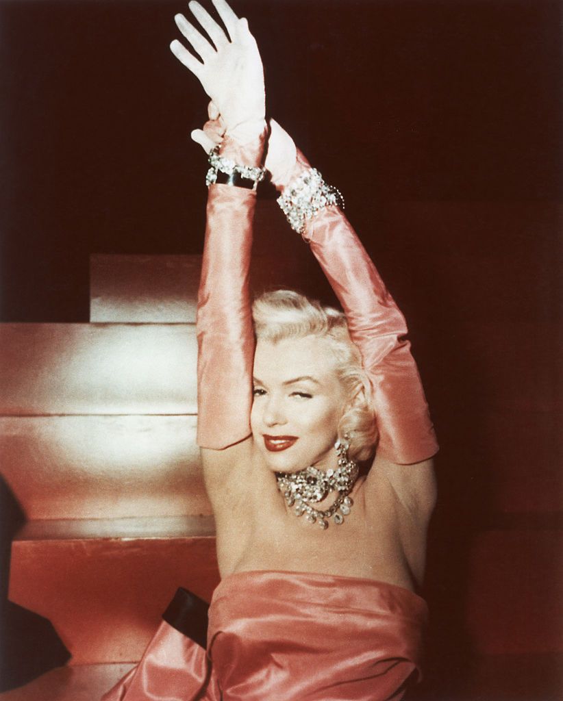American actress Marilyn Monroe (1926 - 1962), as Lorelei Lee, performing a song in a scene from 'Gentlemen Prefer Blondes', directed by Howard Hawks, 1953. (Photo by Hulton Archive/Getty Images)